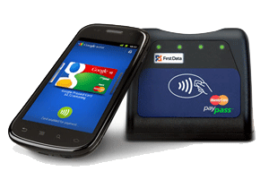 Image of Google Wallet terminal with iPhone